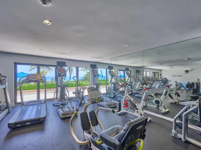 a bedroom with bed and window