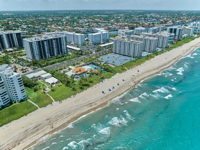 a kitchen with a sink cabinets and appliances