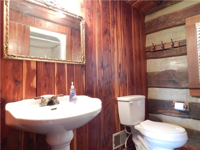 275 Rock Bridge Road Gallatin, TN 37066 - Photo 6 of 16 a bathroom with a sink a toilet and mirror