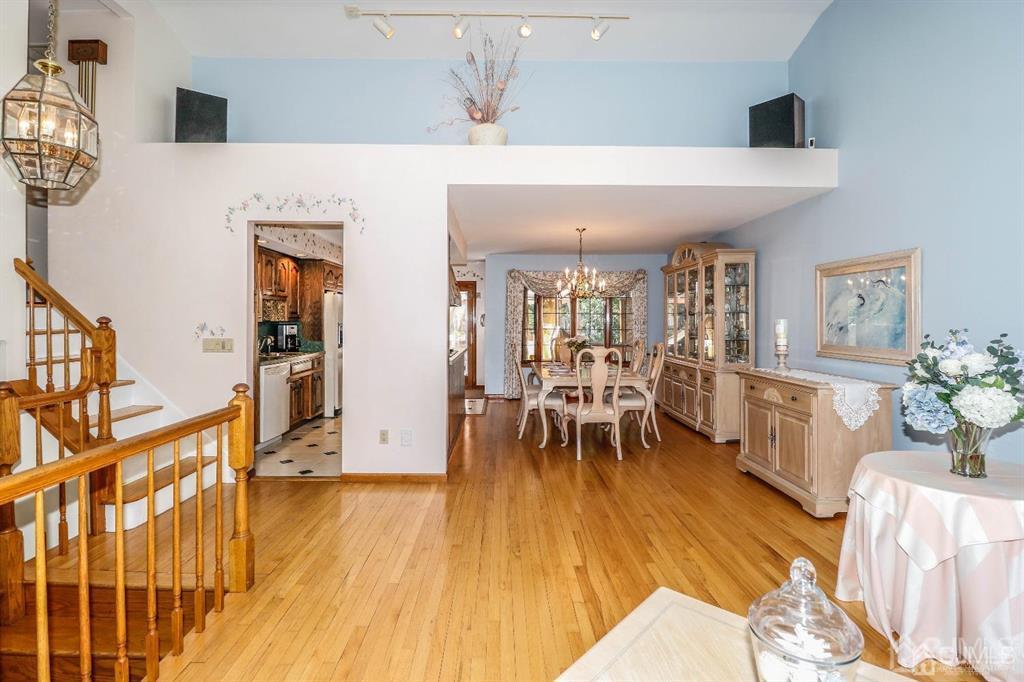 164 Devon Road Colonia, NJ 07067 - Photo 12 of 42 a living room with furniture and a wooden floor