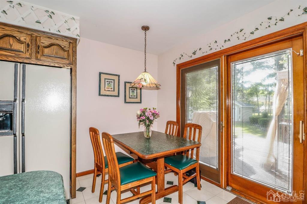 164 Devon Road Colonia, NJ 07067 - Photo 19 of 42 a dining room with furniture and window
