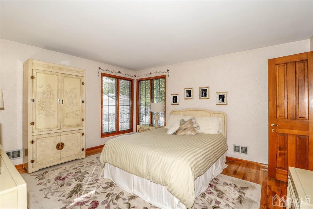 164 Devon Road Colonia, NJ 07067 - Photo 26 of 42 a bedroom with a bed and a window