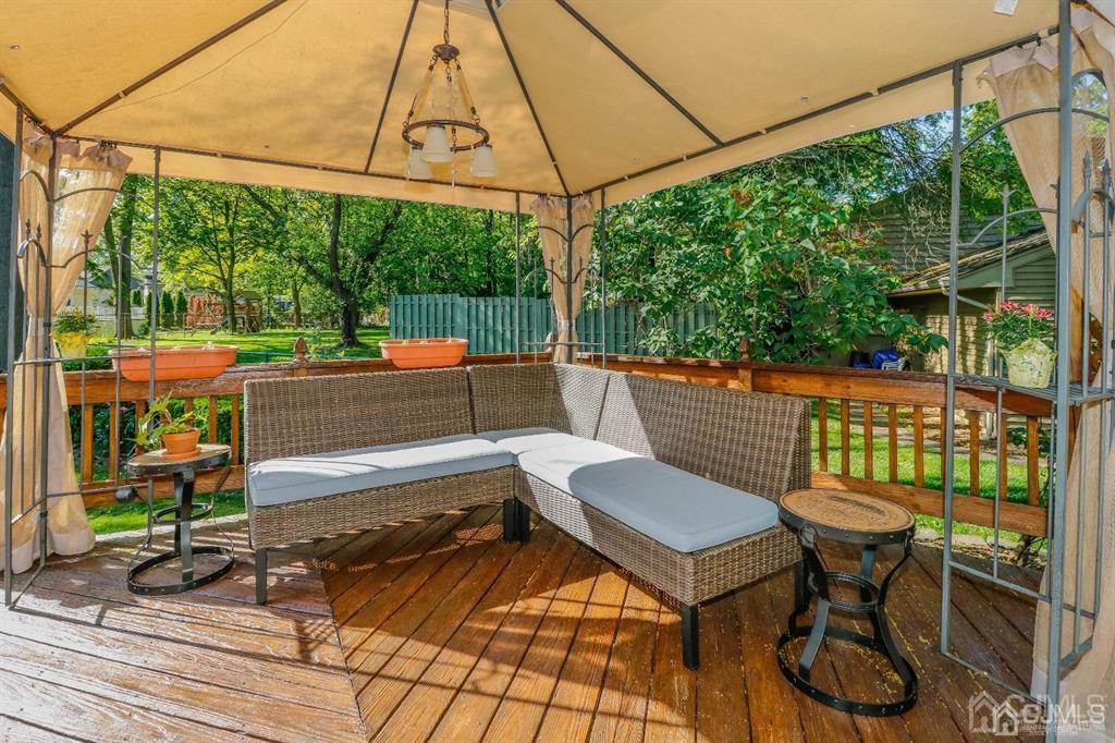 164 Devon Road Colonia, NJ 07067 - Photo 34 of 42 a view of a chairs and table in the patio