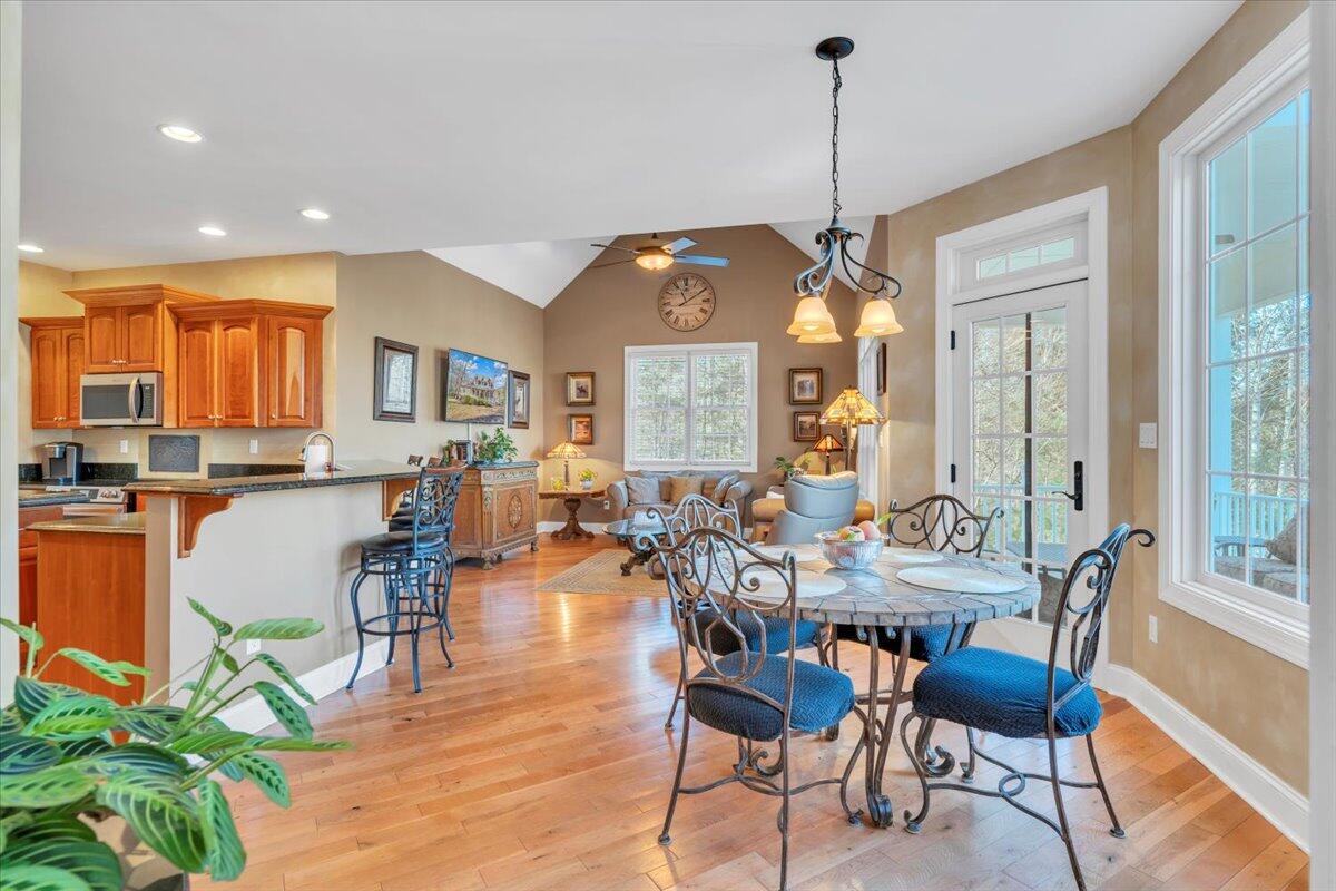 5565 Carons View Lane Roanoke, VA 24014 - Photo 23 of 118 a view of a dining room with furniture window and wooden floor