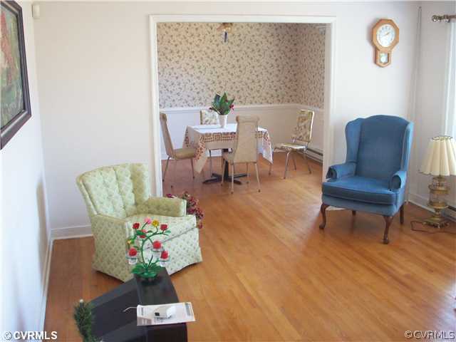 7384 Adams Farm Road Mechanicsville, VA 23111 - Photo 3 of 11 a living room with furniture and a potted plant