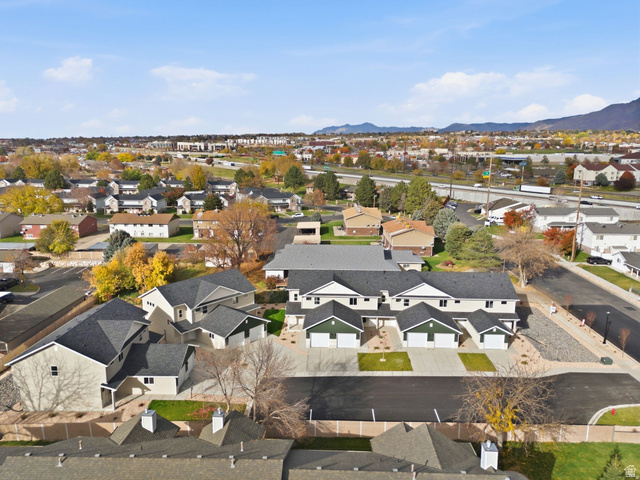 1619 North Angel Street West Layton, UT 84041 - Photo 26 of 32 Aerial view of residential area featuring a mountainous background
