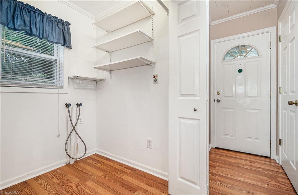 208 Rockspring Drive Thomasville, NC 27360 - Photo 16 of 28 Spacious laundry room beside pantry.