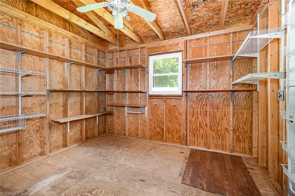 208 Rockspring Drive Thomasville, NC 27360 - Photo 28 of 28 Well organized space in the storage building!