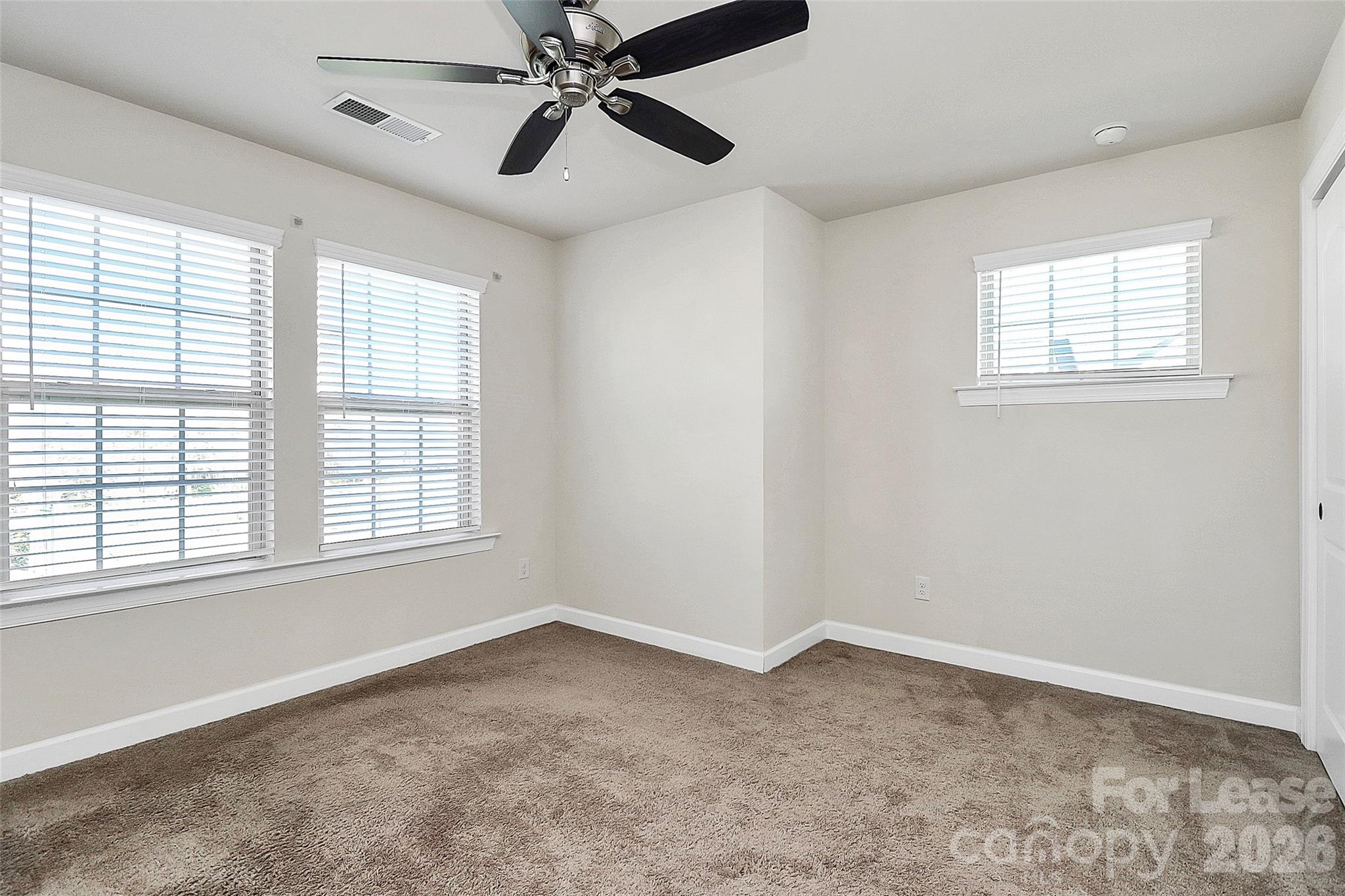 5688 Garrow Glen Road Charlotte, NC 28278 - Photo 15 of 17 a view of an empty room with a window