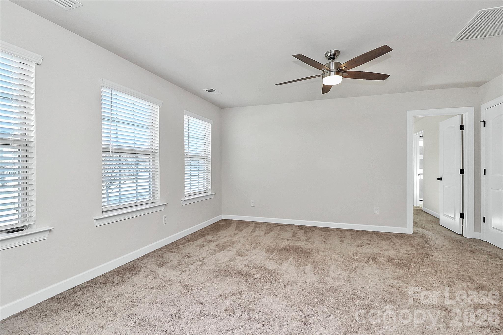 5688 Garrow Glen Road Charlotte, NC 28278 - Photo 7 of 17 a view of an empty room with a window