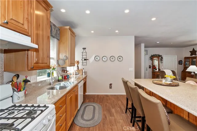 a kitchen with a table and chairs in it