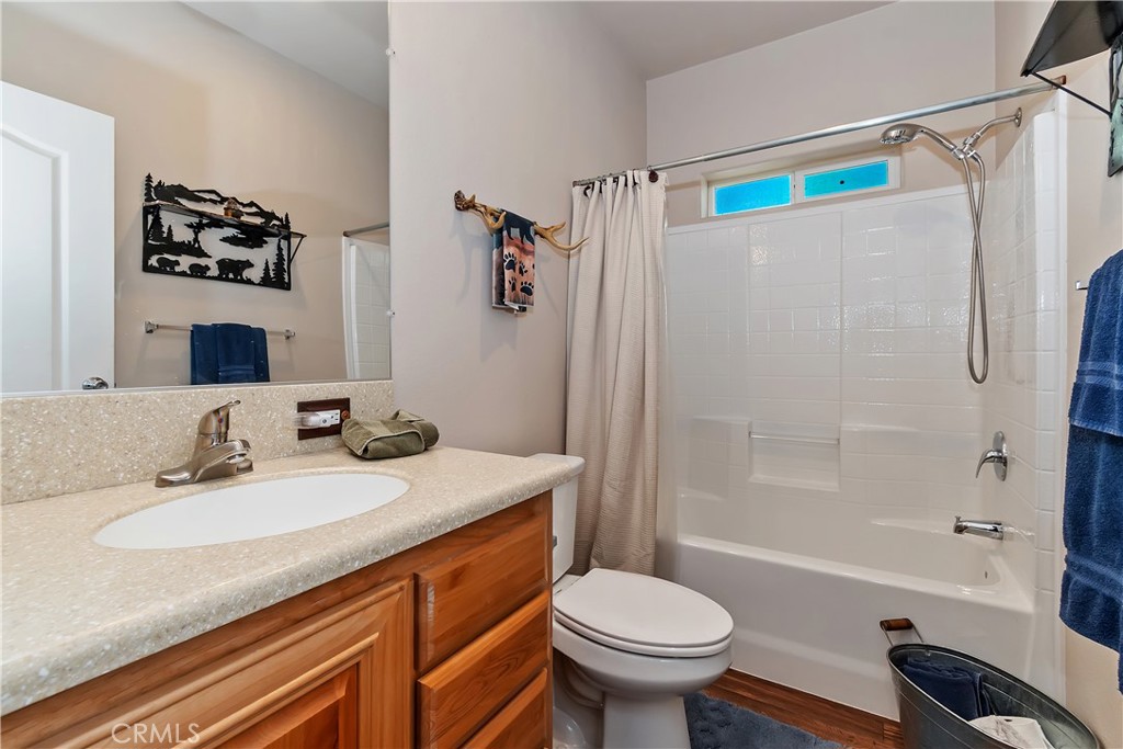 775 Riverside Avenue Sugarloaf, CA 92386 - Photo 27 of 32 a bathroom with a sink toilet and shower