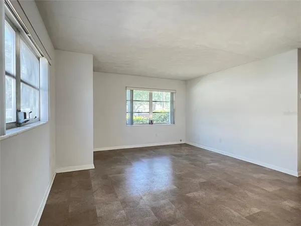 a view of an empty room and window
