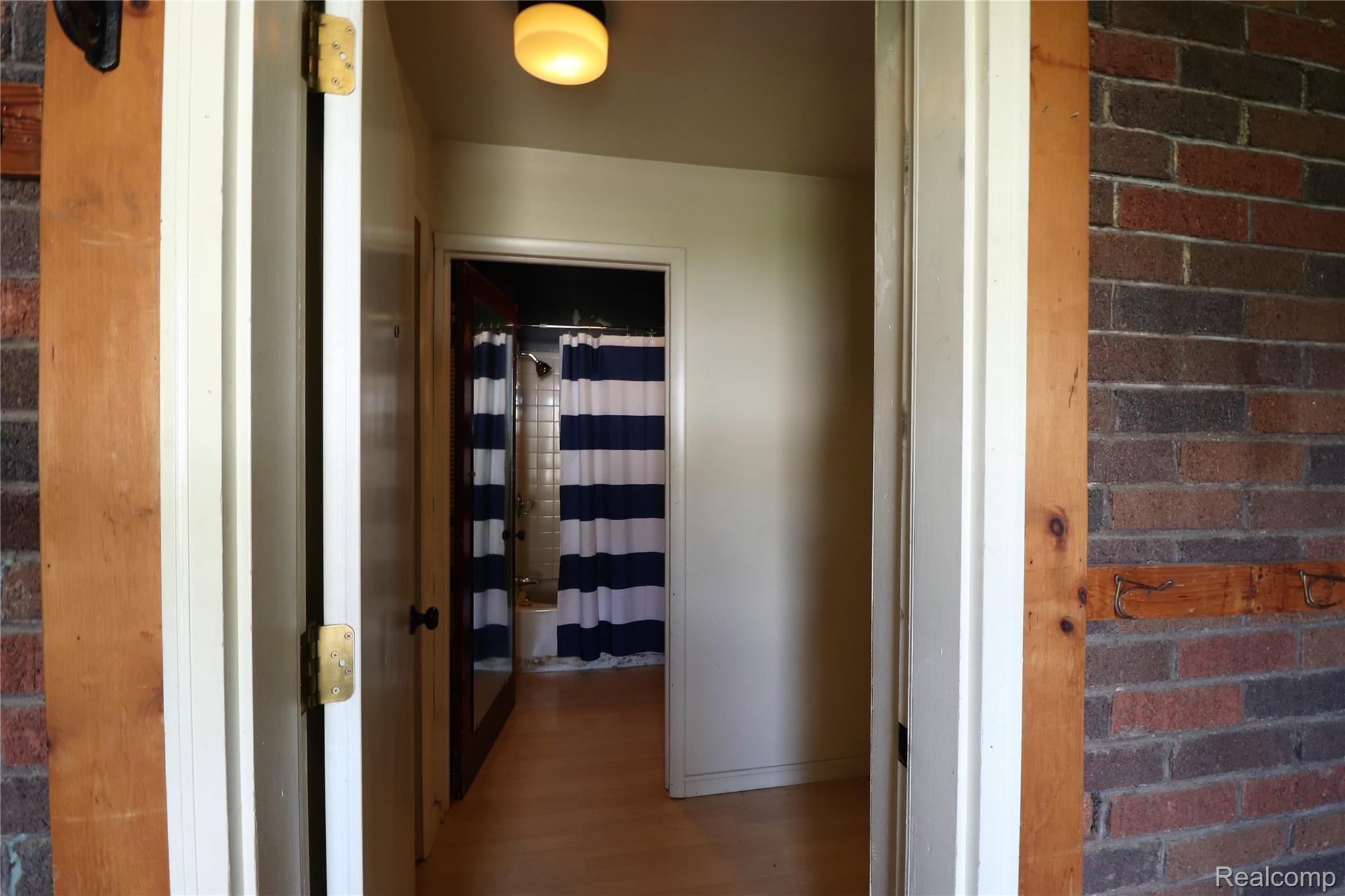 7215 North Genesee Road Genesee, MI 48437 - Photo 17 of 23 Apartment Entrance off of breezway.JPG