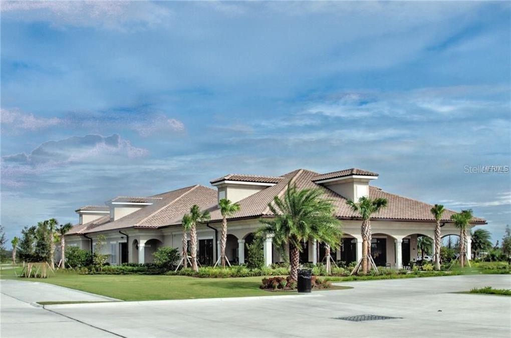 5528 Arnie Loop Lakewood Ranch, FL 34211 - Photo 39 of 59 front view of a house with a street