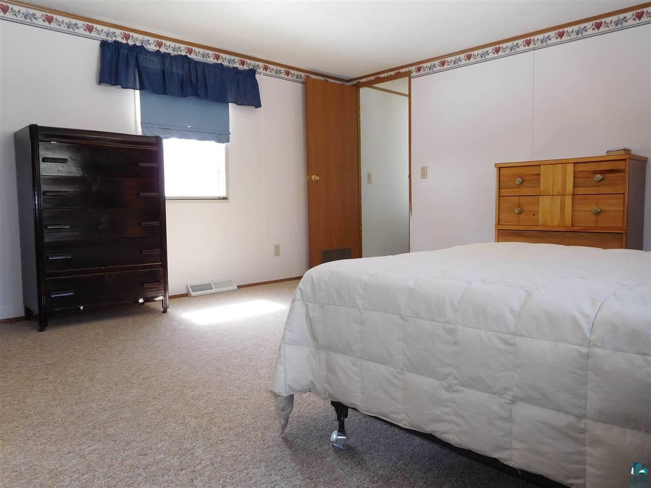 29625 McKinley Road Washburn, WI 54891 - Photo 9 of 24 Master Bedroom W/Two Closets