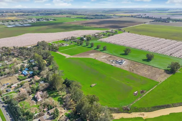 a view of a lake with a big yard