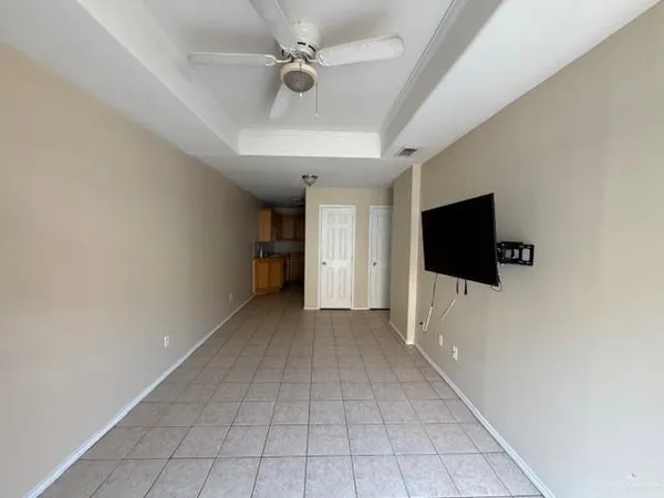 a view of a livingroom with a flat screen tv