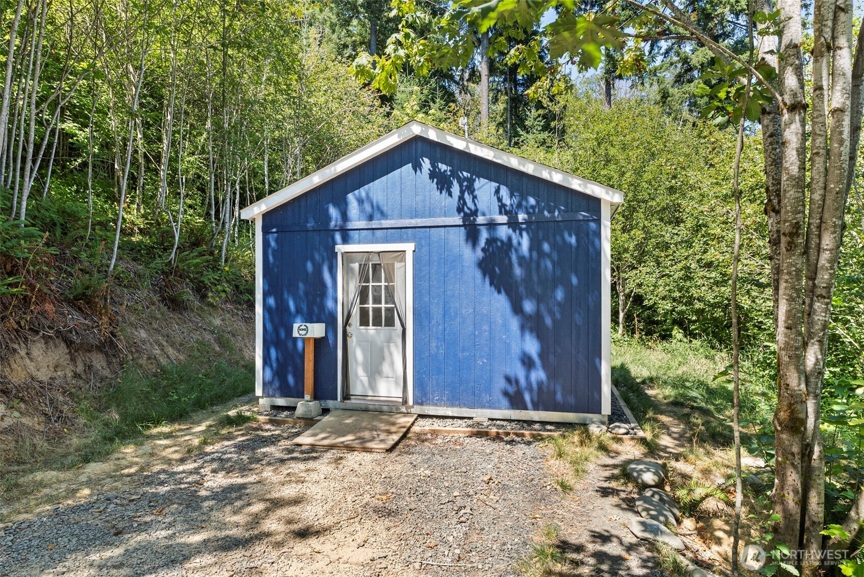 179 Halliday Road Centralia, WA 98531 - Photo 16 of 34 a view of a house with large tree and wooden fence