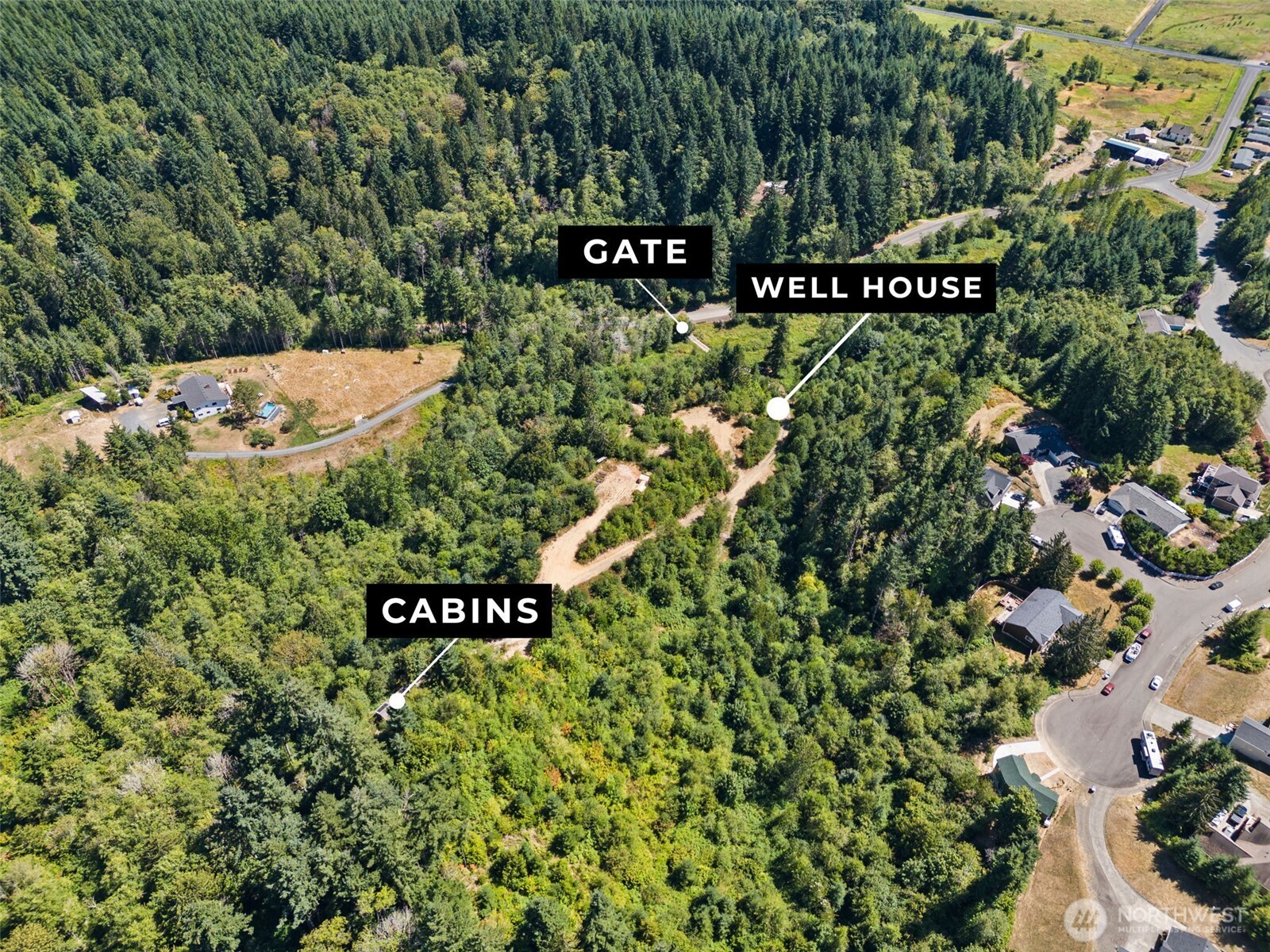 179 Halliday Road Centralia, WA 98531 - Photo 21 of 34 a sign that is sitting in front of a tree