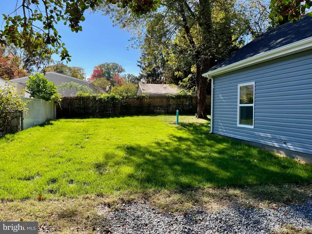 a view of swimming pool with a backyard