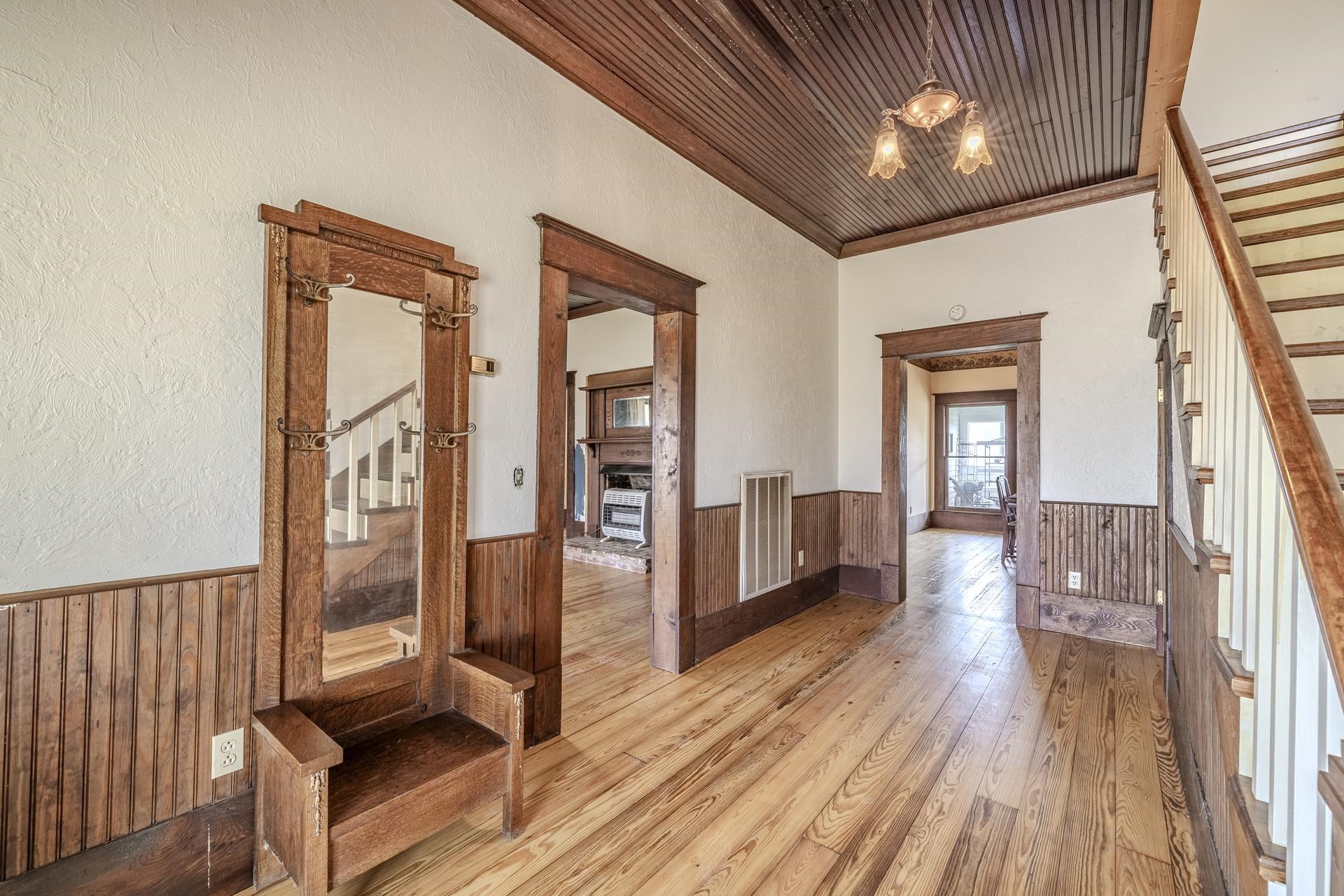2055 Kendrick Road Michie, TN 38357 - Photo 12 of 37 a view of a hallway with wooden floor and staircase