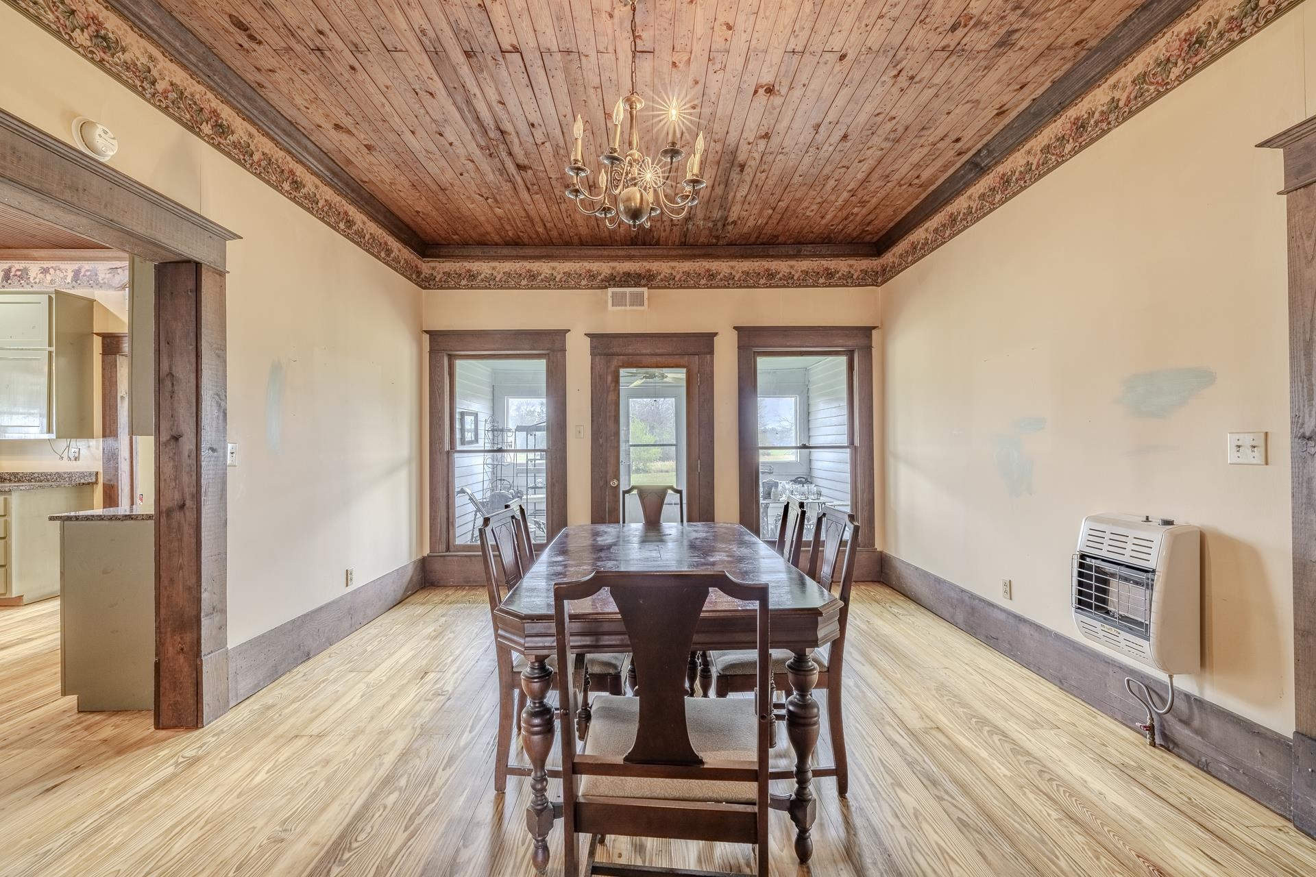 2055 Kendrick Road Michie, TN 38357 - Photo 15 of 37 a view of a dining room with furniture window and wooden floor