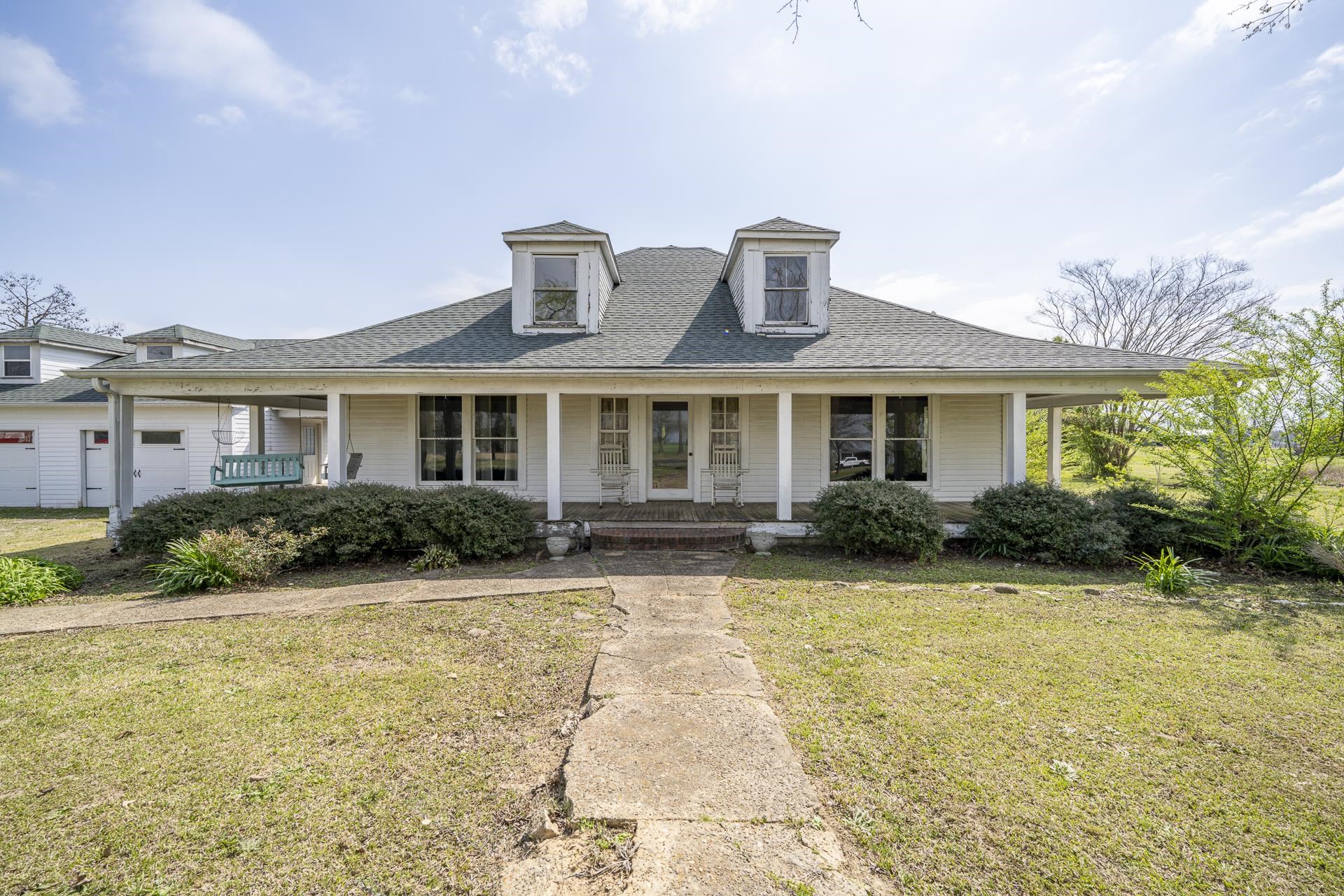 2055 Kendrick Road Michie, TN 38357 - Photo 2 of 37 a front view of a house with a yard