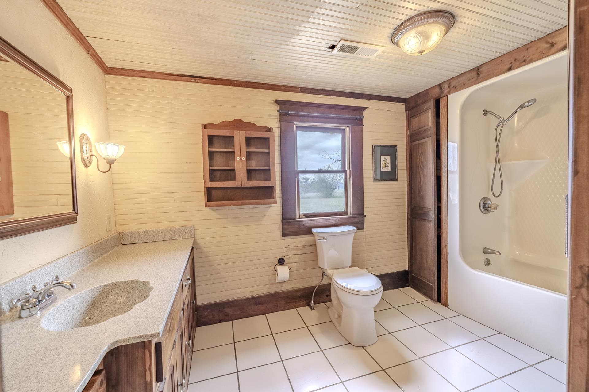2055 Kendrick Road Michie, TN 38357 - Photo 24 of 37 a bathroom with a sink toilet and shower