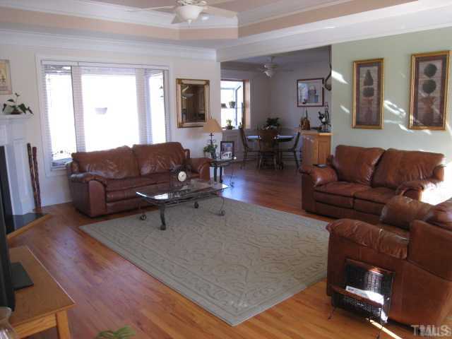 1010 Redleaf Lane Rougemont, NC 27572 - Photo 3 of 11 a living room with furniture and wooden floor