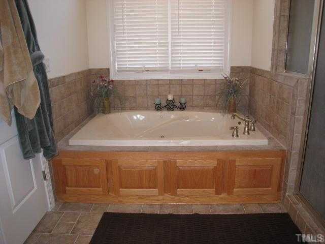 1010 Redleaf Lane Rougemont, NC 27572 - Photo 8 of 11 a bathroom with a bathtub