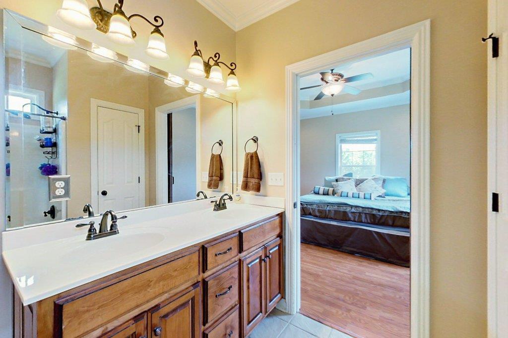 962 Mt Vernon Road Bethpage, TN 37022 - Photo 13 of 23 a bathroom with a sink double vanity granite and a mirror