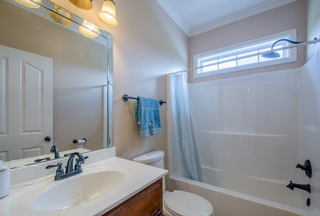 962 Mt Vernon Road Bethpage, TN 37022 - Photo 16 of 23 a bathroom with a sink toilet and shower