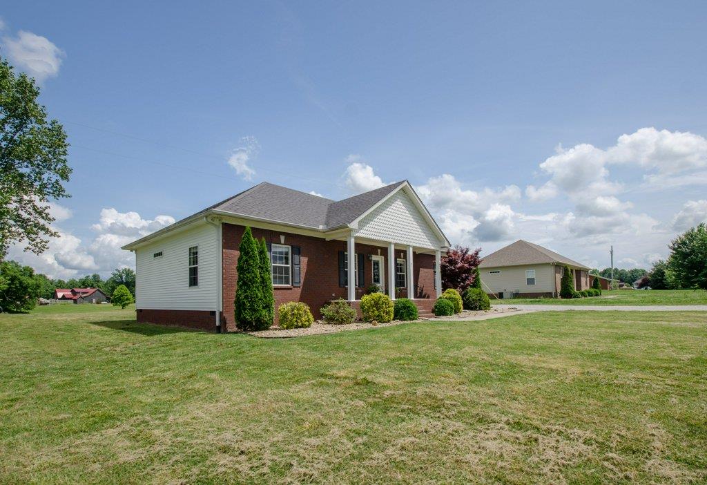 962 Mt Vernon Road Bethpage, TN 37022 - Photo 18 of 23 a front view of house with yard and green space