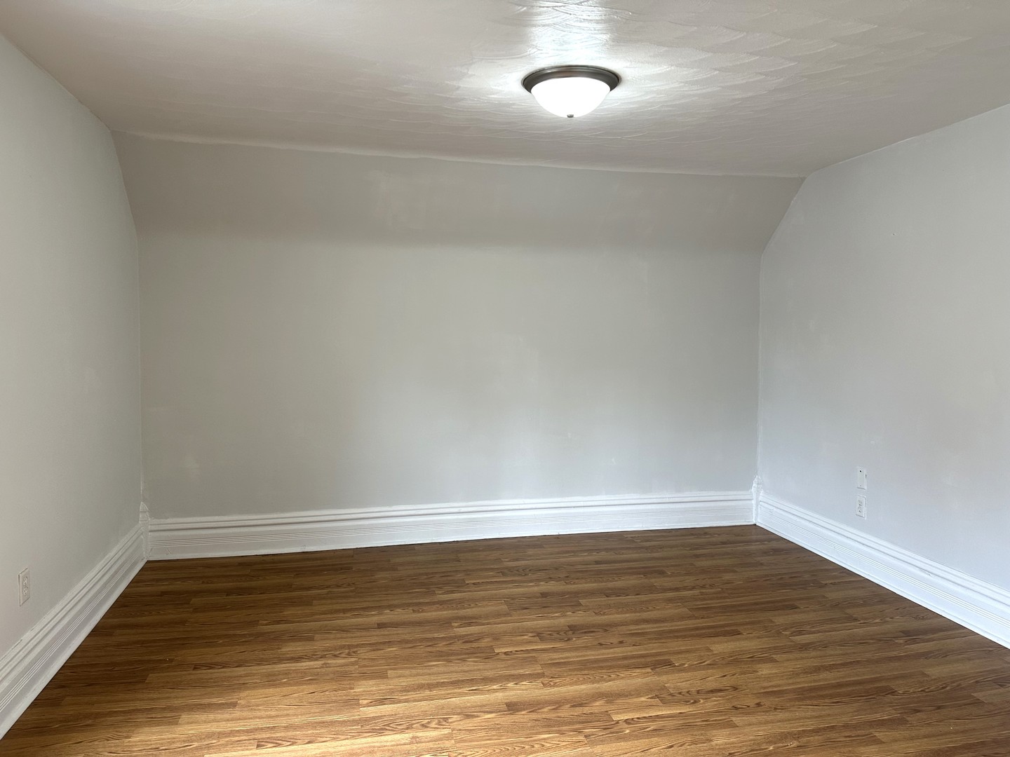 318 North Street Elgin, IL 60120 - Photo 4 of 5 a view of an empty room with wooden floor