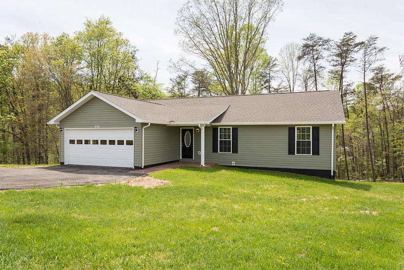 5261 Saunders Road Vinton, VA 24179 - Photo 3 of 47 a view of a house with a yard and large tree