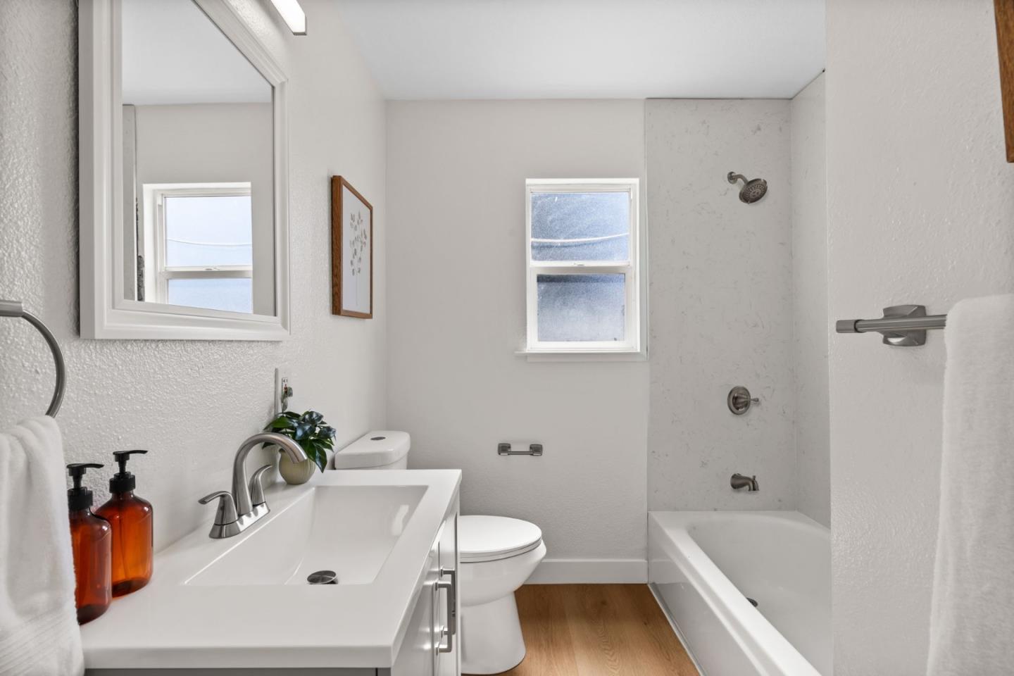 20860 Baker Road Castro Valley, CA 94546 - Photo 12 of 21 a bathroom with a sink a toilet and shower