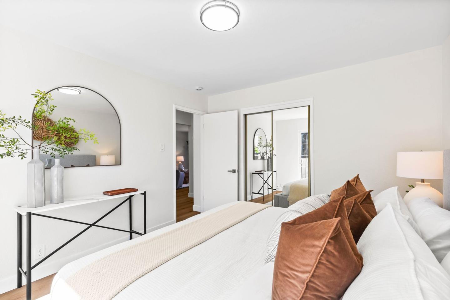 20860 Baker Road Castro Valley, CA 94546 - Photo 15 of 21 a bedroom with a bed and a potted plant