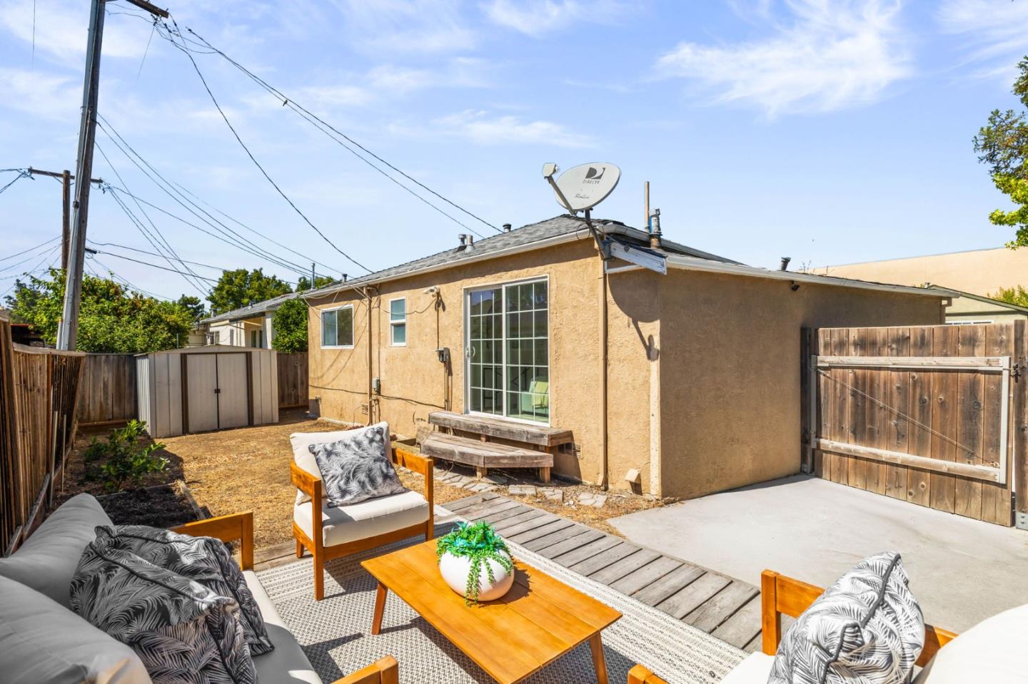 20860 Baker Road Castro Valley, CA 94546 - Photo 18 of 21 a view of a patio with couches table and chairs and potted plants
