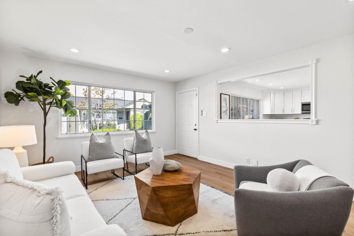 20860 Baker Road Castro Valley, CA 94546 - Photo 4 of 21 a living room with furniture and a potted plant