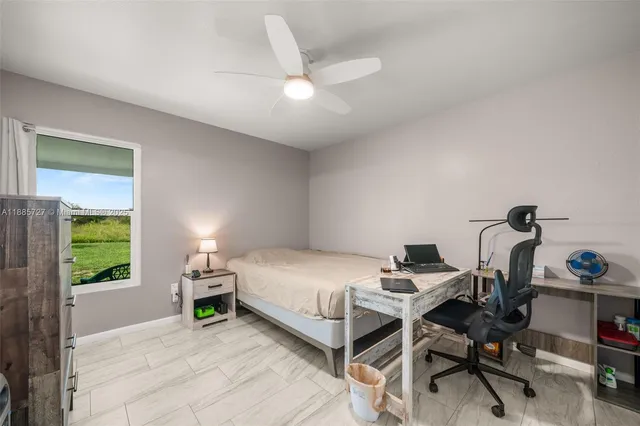 a bed room with a bed and a table