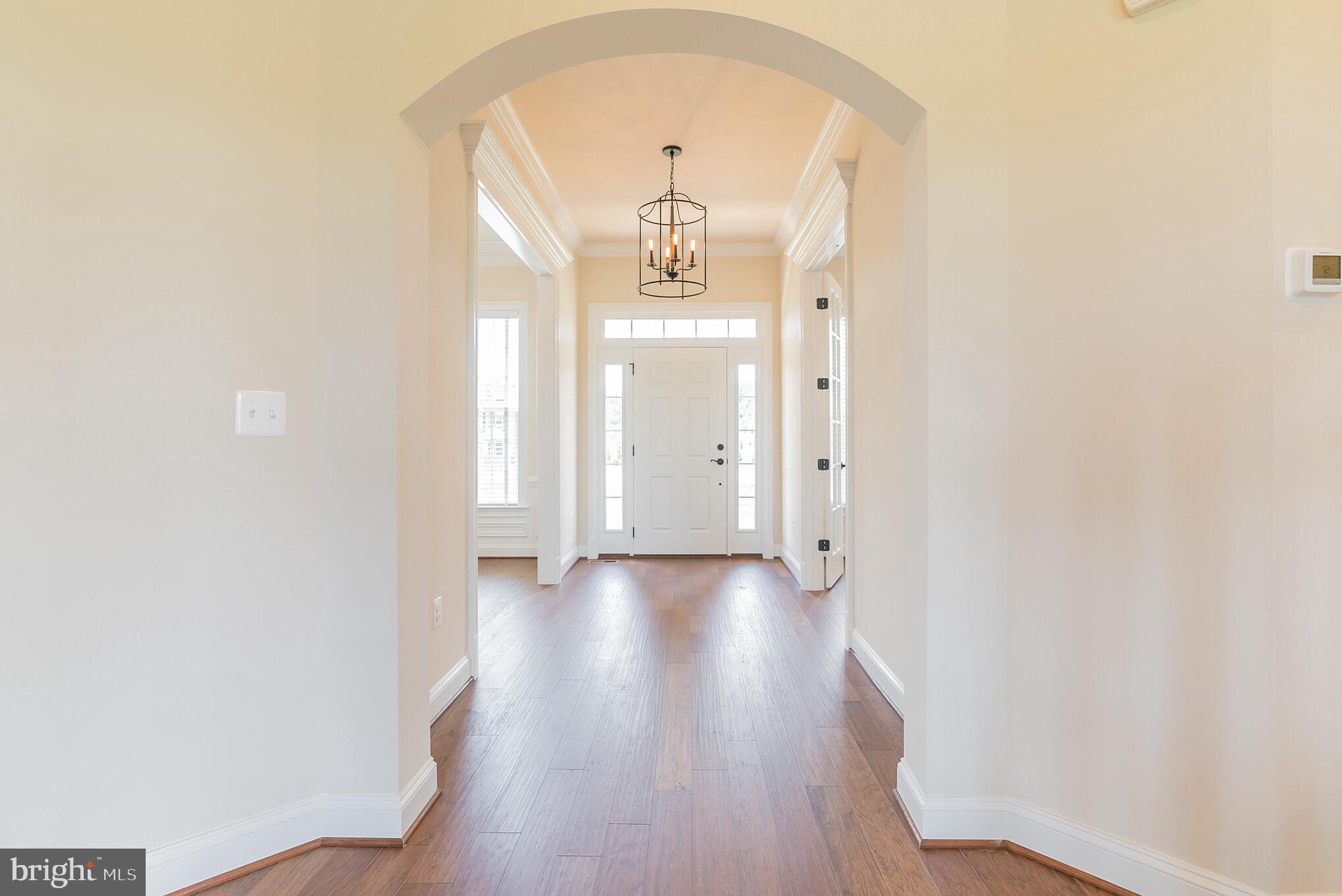 Red Oak Road Cross Junction, VA 22625 - Photo 8 of 11 a view of a hallway with wooden floor and closet
