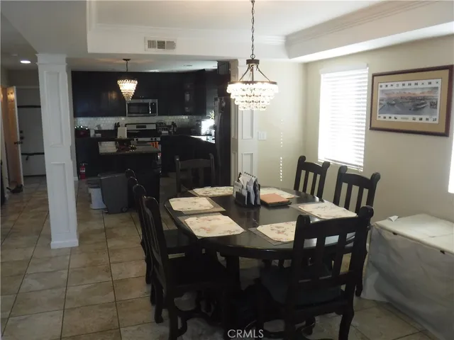 a view of a dining room with furniture