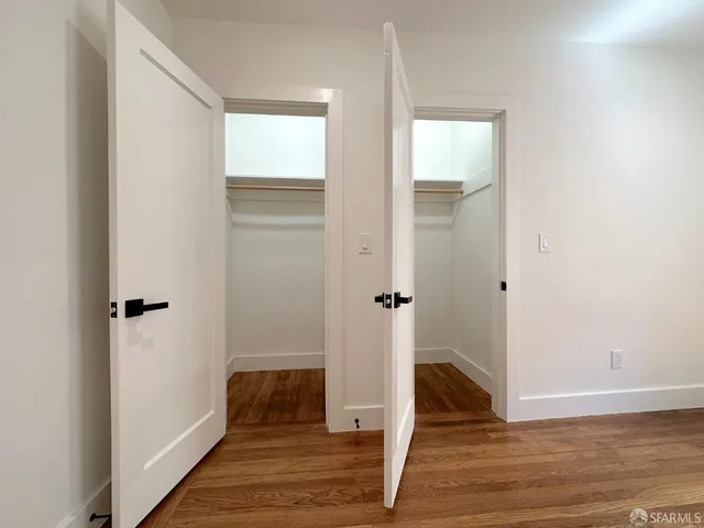 a view of entryway with wooden floor