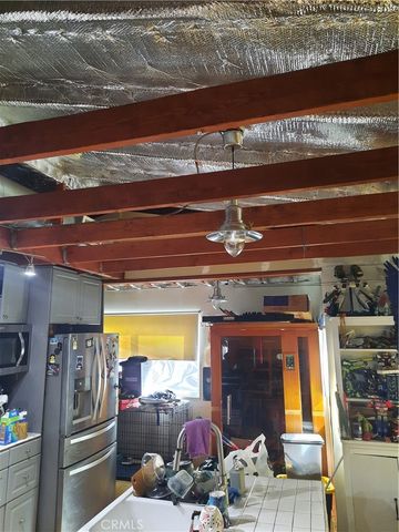 a view of a chairs and table in a patio