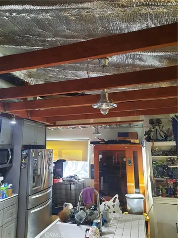 a view of a chairs and table in a patio