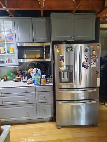 a bedroom with furniture and bed