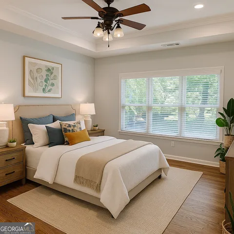 a bedroom with bed and glass window