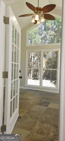 a view of a room with a large window
