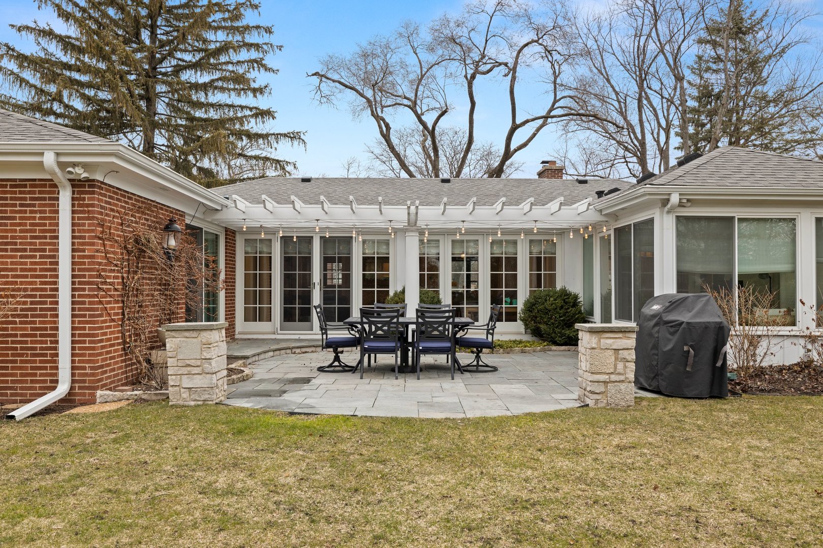 2441 Pick Drive Glenview, IL 60025 - Photo 22 of 43 a view of a building with sitting area and garden